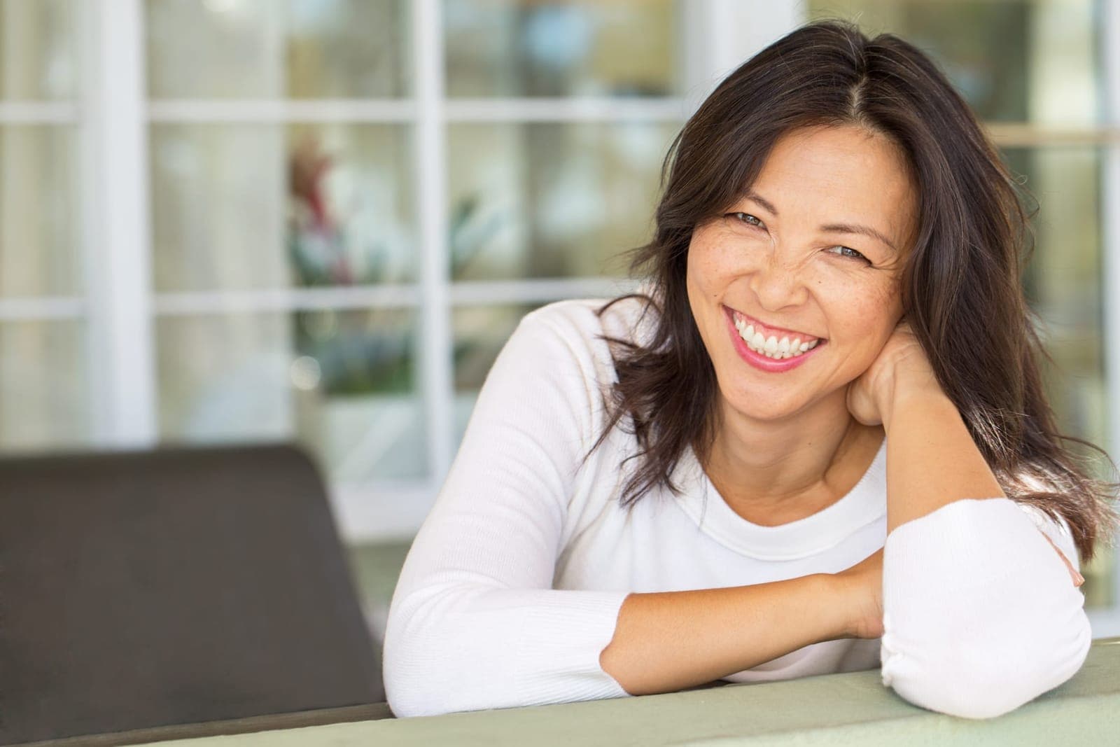 Patient with a beautiful smile at Sherwood Park Dental Care Centre