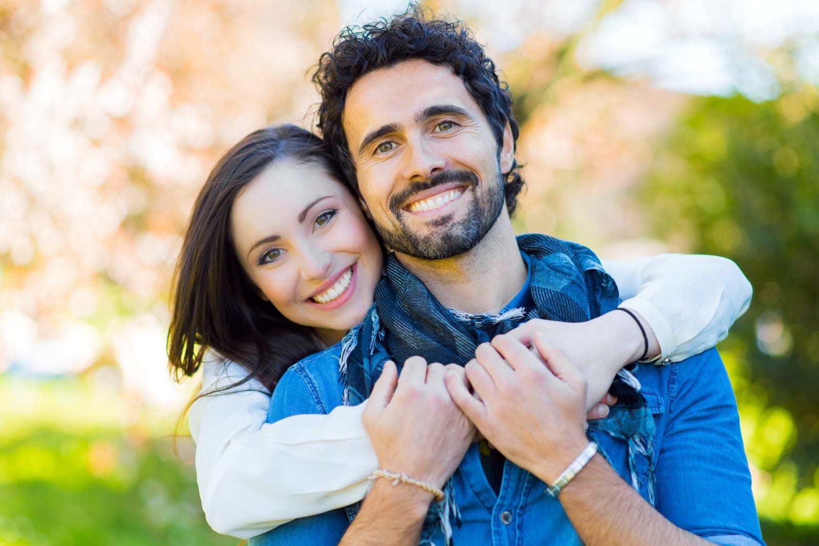 Happy couple with beautiful smiles at Sherwood Park Dental Care Centre