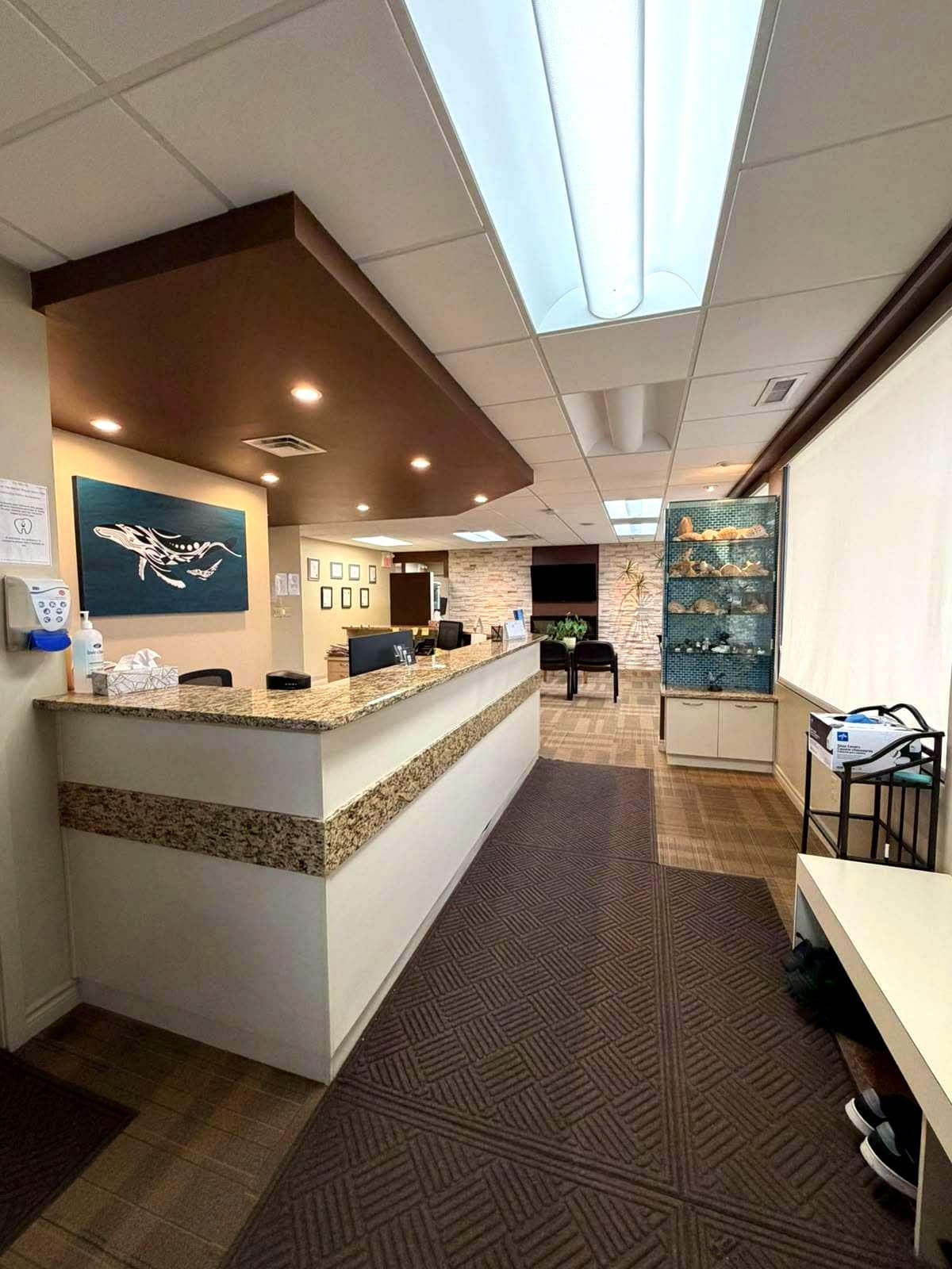 Reception counter and waiting lounge with warm feature lighting